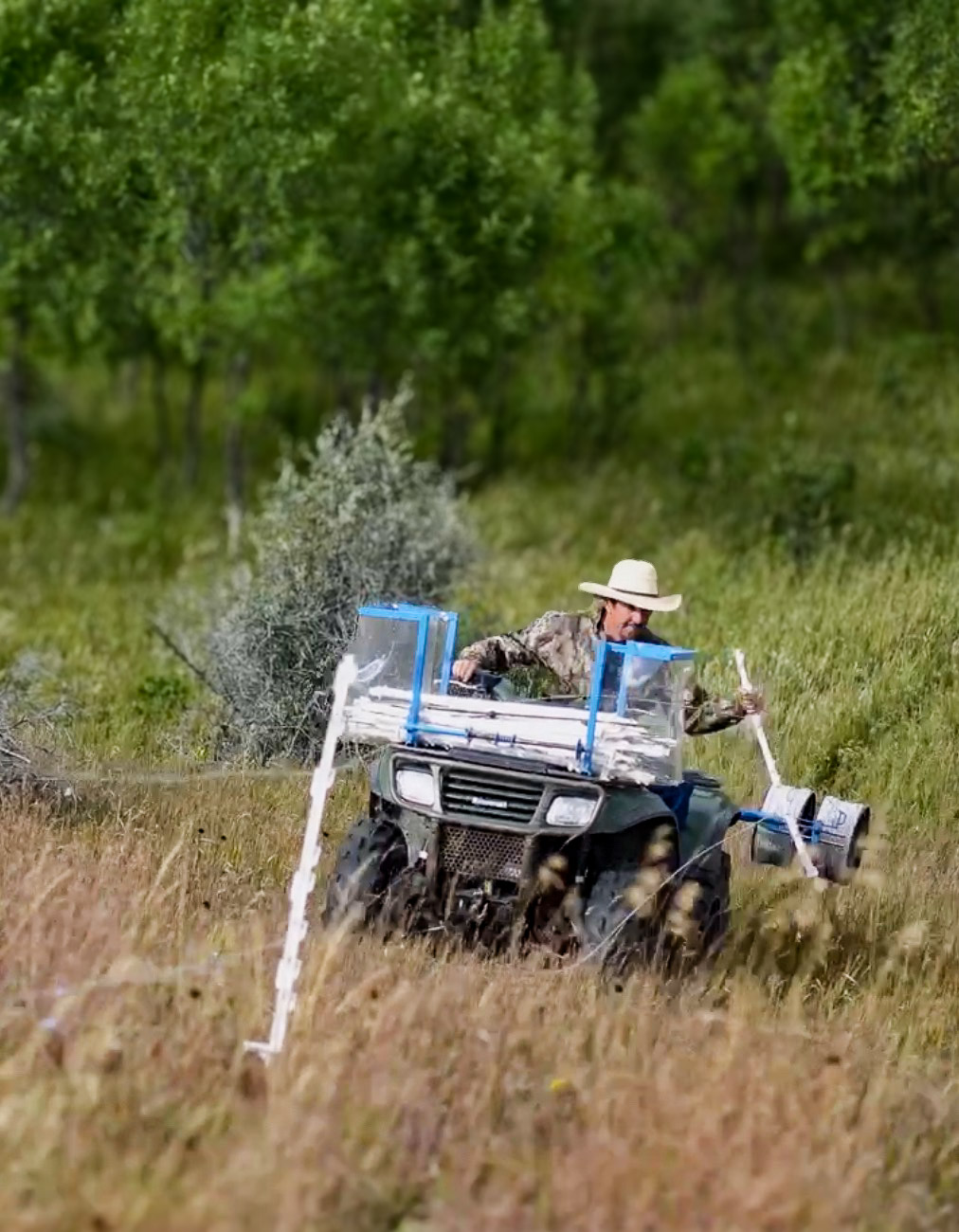 The Tire WInder ATV attachment pulling up electric fence easily and quickly.