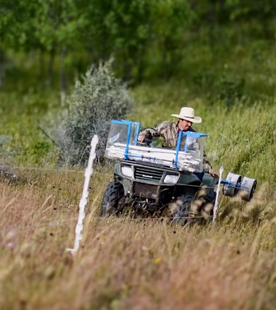 The Tire WInder ATV attachment pulling up electric fence easily and quickly.