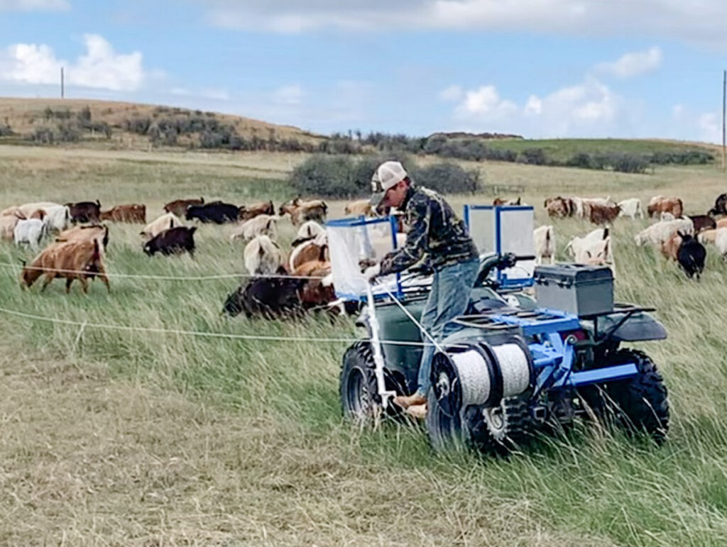 Picking up electric posts with the Tirewinder ATV Attachment